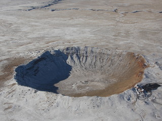 Arizona Meteor Crater aerial view, Flagstaff, AZ, winter. Size reference single bus on tarmac at lower right edge © ifrpilot