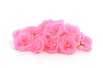 pink rose artificial flower on white background