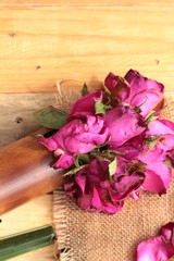 Pink roses and rose petals were sprinkled fallen.