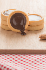 chocolate cookies on wooden board