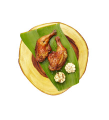 thai chicken grilled with herb on wooden tray