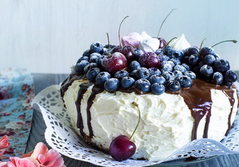 Cake with cream and blueberries