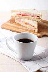 sandwich with ham, cheese and tomato