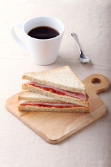 sandwich with ham, cheese and tomato