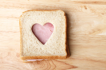 Obraz na płótnie Canvas whole wheat sandwich, cut to heart shape