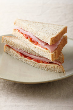 sandwich with ham, cheese and tomato