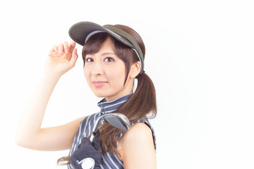 ゴルフウェアを着た若い日本人女性