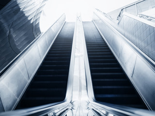 Escalator of Modern building Blue toned images