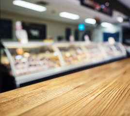 Table Top counter with Blurred Fresh food Butcher display in Supermarket