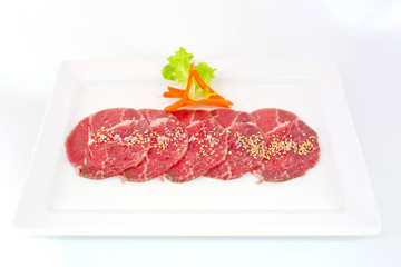 High grade sliced Hida wagyu beef isolated on white background