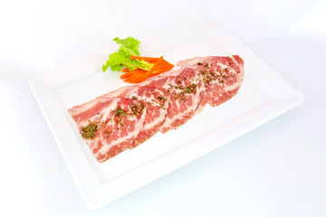 freshness slided pork on white dish for grill
