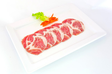 freshness slided pork on white dish for grill