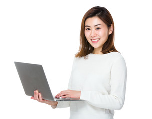 Asian woman use of the laptop computer