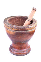 wooden mortar and pestle isolated on white background