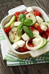 salad with fresh vegetables and feta cheese
