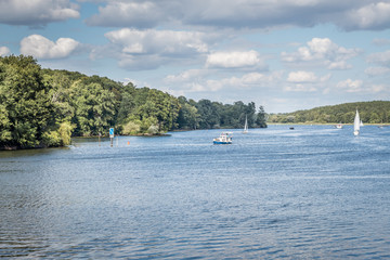 lake, trees, clouds and boats