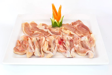 Fresh slices of chicken isoloate on white background ready to be