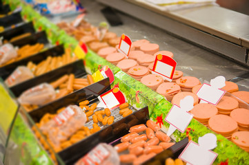 Variety of sausage delicatessen on table in store