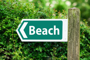 Direction Arrow, Sign To The Beach on Green Color