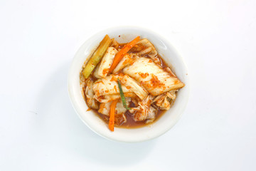 close-up kimuchi on white dish isolate on white background