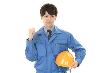 ガッツポーズの労働者