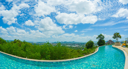 Scenic hillside river pool with great view to surroundings in op