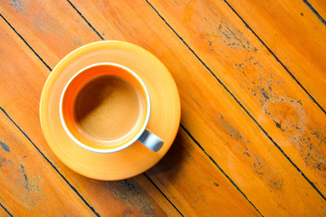 coffee in ceramic orange cup