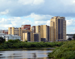 Fototapeta na wymiar New residential complex in Vologda on the river bank