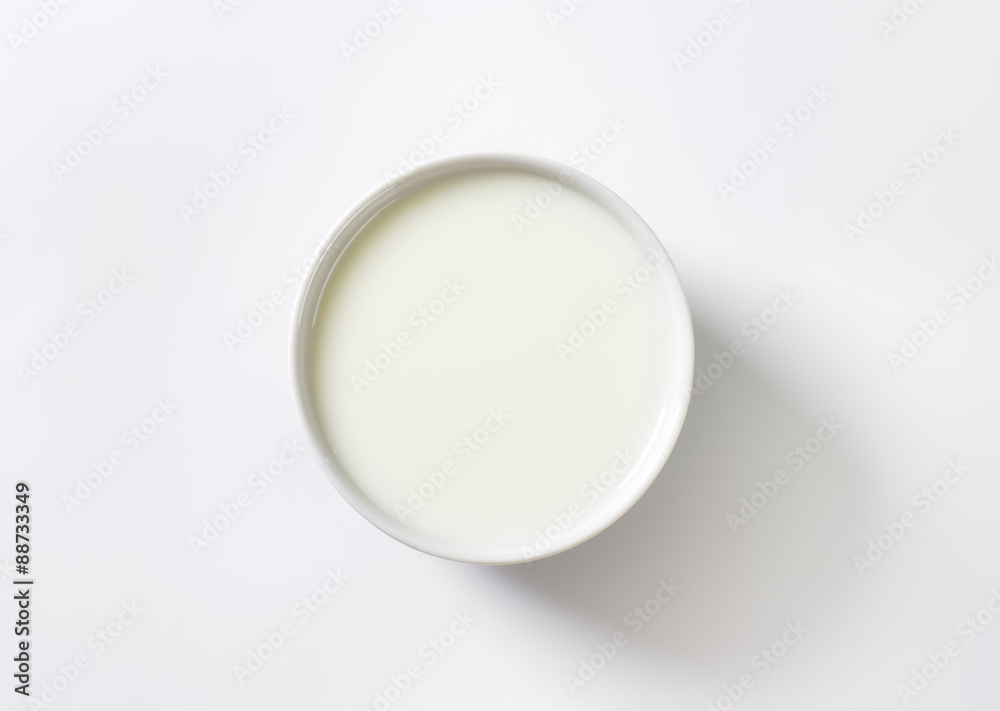 Sticker bowl of fresh milk