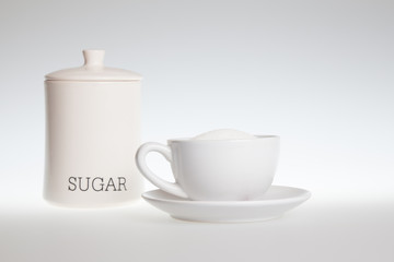 tea cup full of sugar