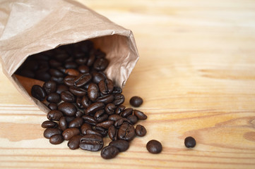 Coffee beans on wooden background