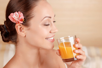 Nice woman drinking juice 