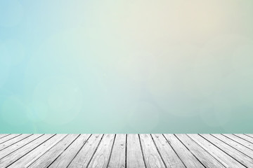 wooden floor with pastel sky blurred background