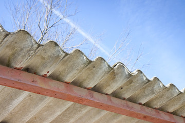 Detail of a dangerous asbestos roof - image with copy space