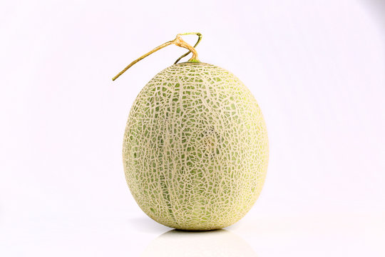 Fresh organic Japanese melon isolated on white background