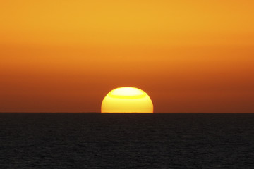 Sunset at sea from ship