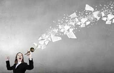 Woman speaking in horn