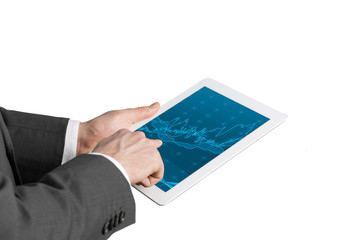 Close up of hands with tablet and forex screen. Isolated.