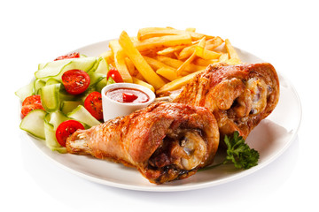 Grilled turkey thighs with chips and vegetables 