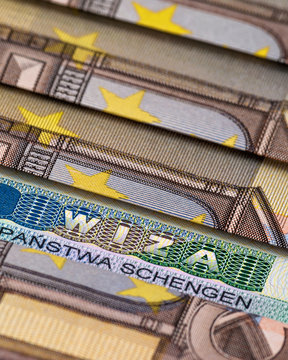 Schengen visa among many European banknotes