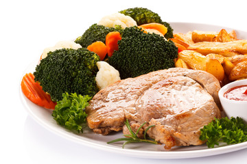 Steak, baked potatoes and vegetables 
