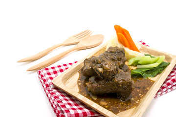 Delicious honey pork ribs baked with vegetable