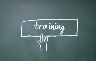 finger click training symbol on blackboard