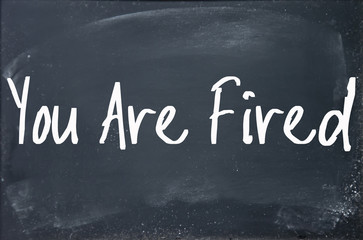 Fototapeta premium you are fired text write on blackboard