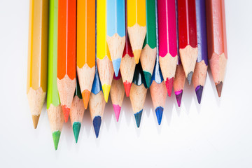 Colour pencils isolated on white background close up