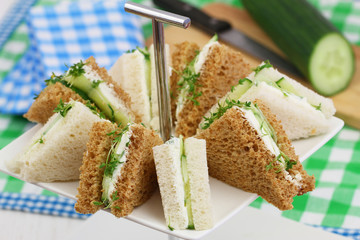 White and brown cream cheese and cucumber sandwiches
