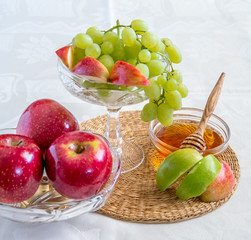 Honey, apples and grapes for Jewish New Year celebration.