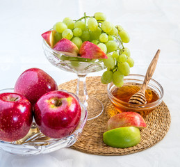 Honey, apples and grapes for Jewish New Year celebration.