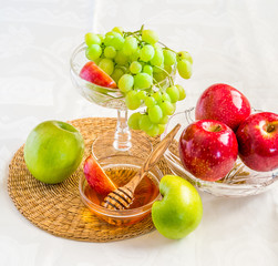 Honey, apples and grapes for Jewish New Year celebration.