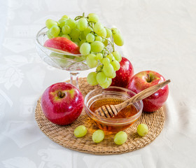 Honey, apples and grapes for Jewish New Year celebration.